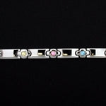 A durable and glamorous LIFETAG Medical ID bracelet made of stainless steel. Each link is set with a different multi-colored cubic zirconia (CZ) stone, creating a bright, cheery look. A central slide holds the medical identification information.